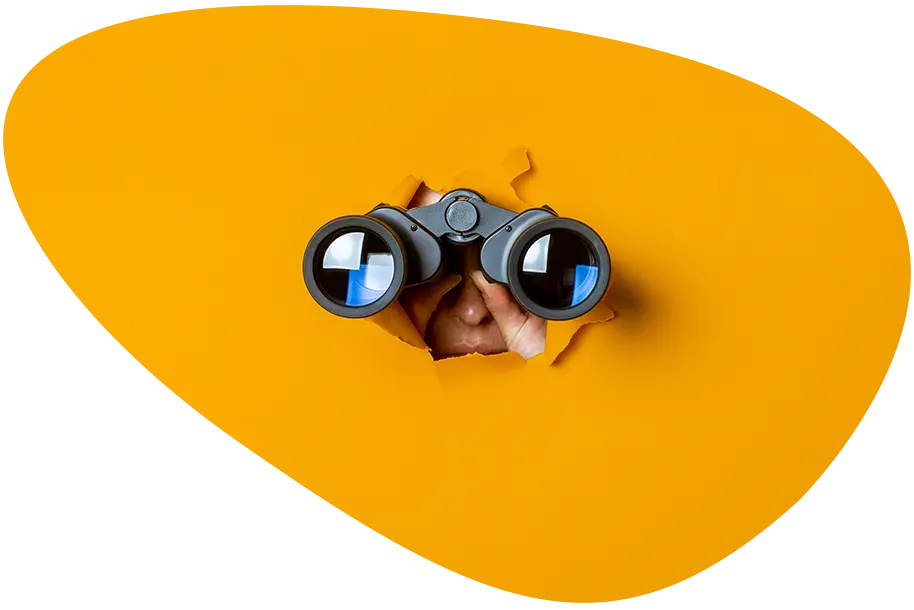 Zu sehen ist ein Fernglas, welches durch einen gelben Hintergrund stößt